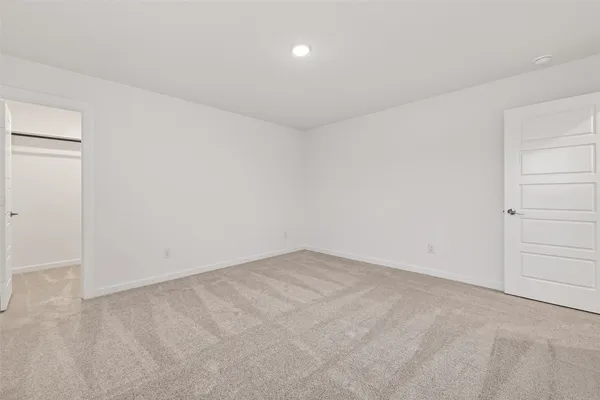 an empty room with an entryway