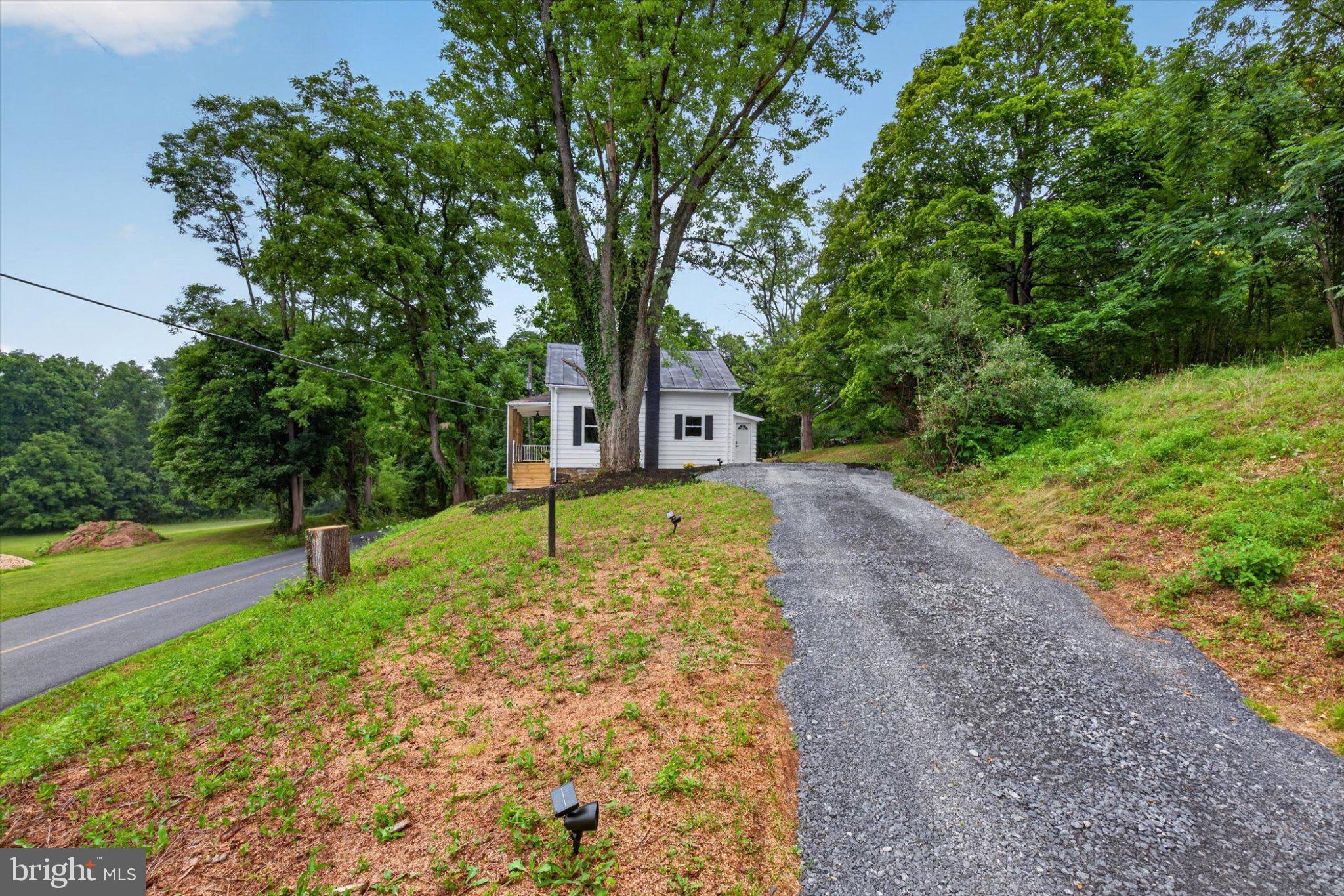 140 Creek Road Shermans Dale, PA 17090 - Photo 3 of 36 Charming home nestled in nature's embrace.