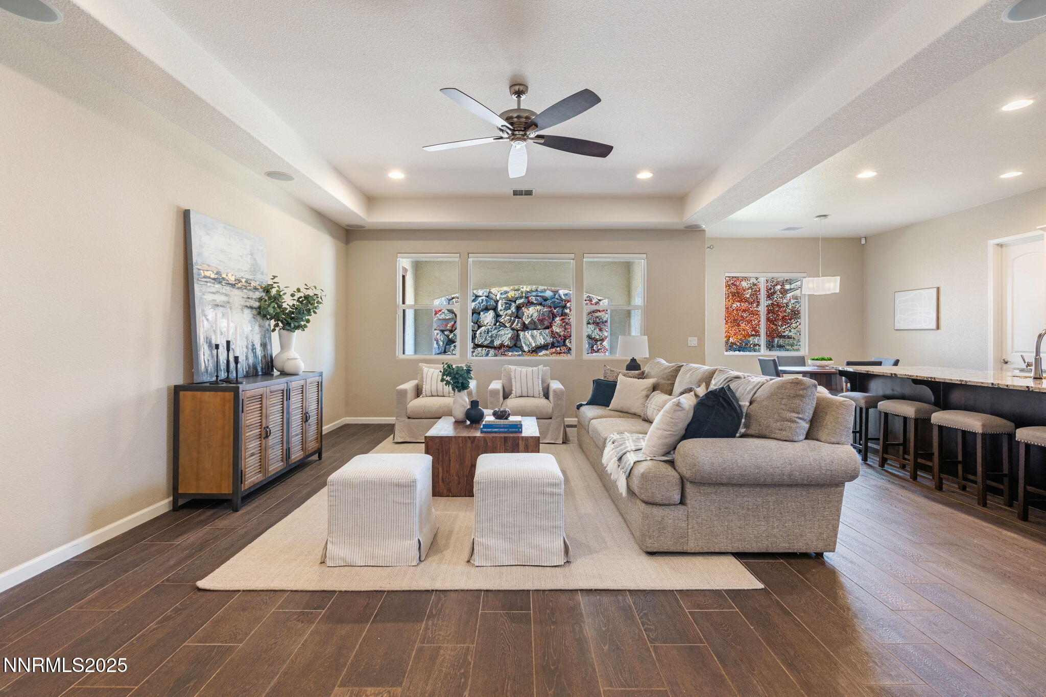 1755 Back Nine Trail Reno, NV 89523 - Photo 21 of 49 a living room with furniture a large window and wooden floor