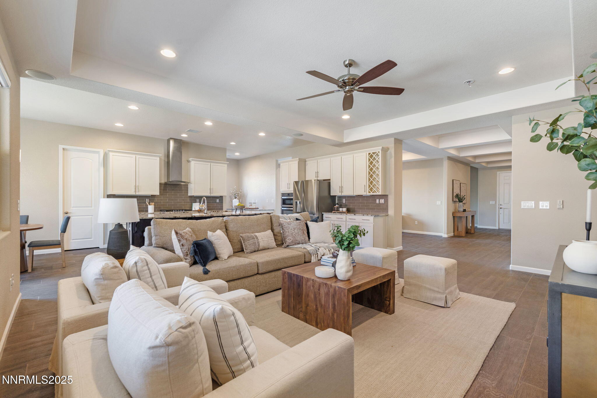 1755 Back Nine Trail Reno, NV 89523 - Photo 24 of 49 a living room with furniture kitchen view and a potted plant
