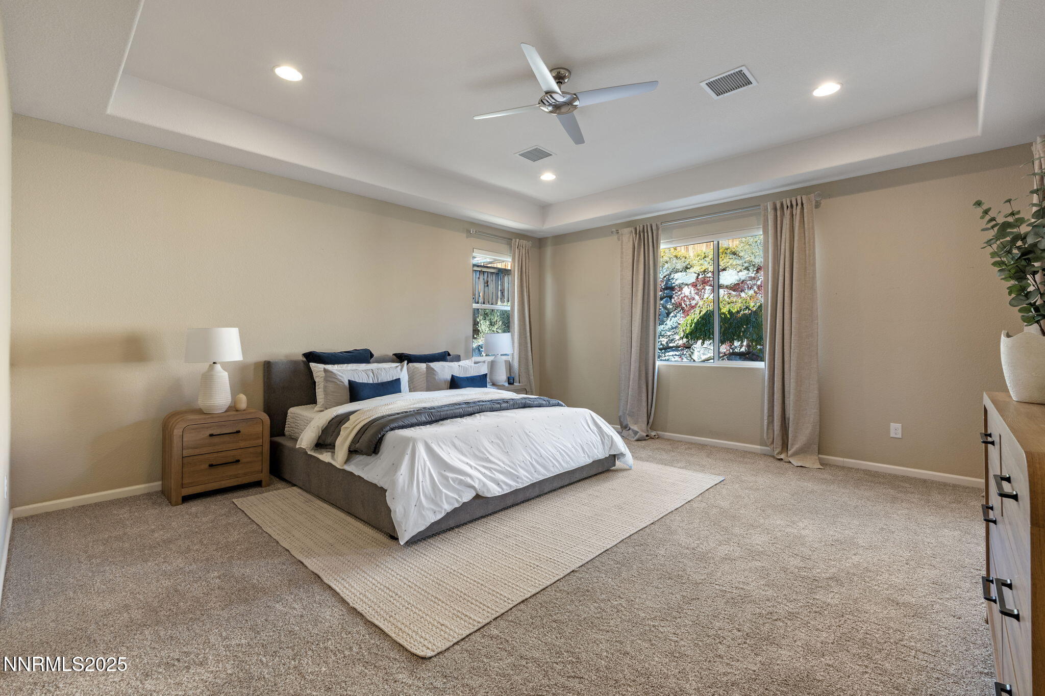 1755 Back Nine Trail Reno, NV 89523 - Photo 25 of 49 a spacious bedroom with a bed and window