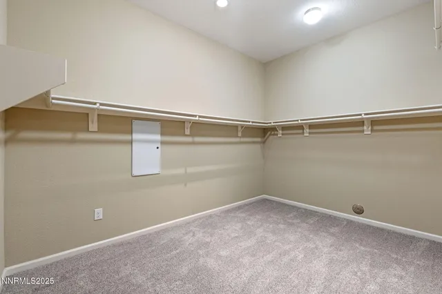 a view of an empty walk in closet