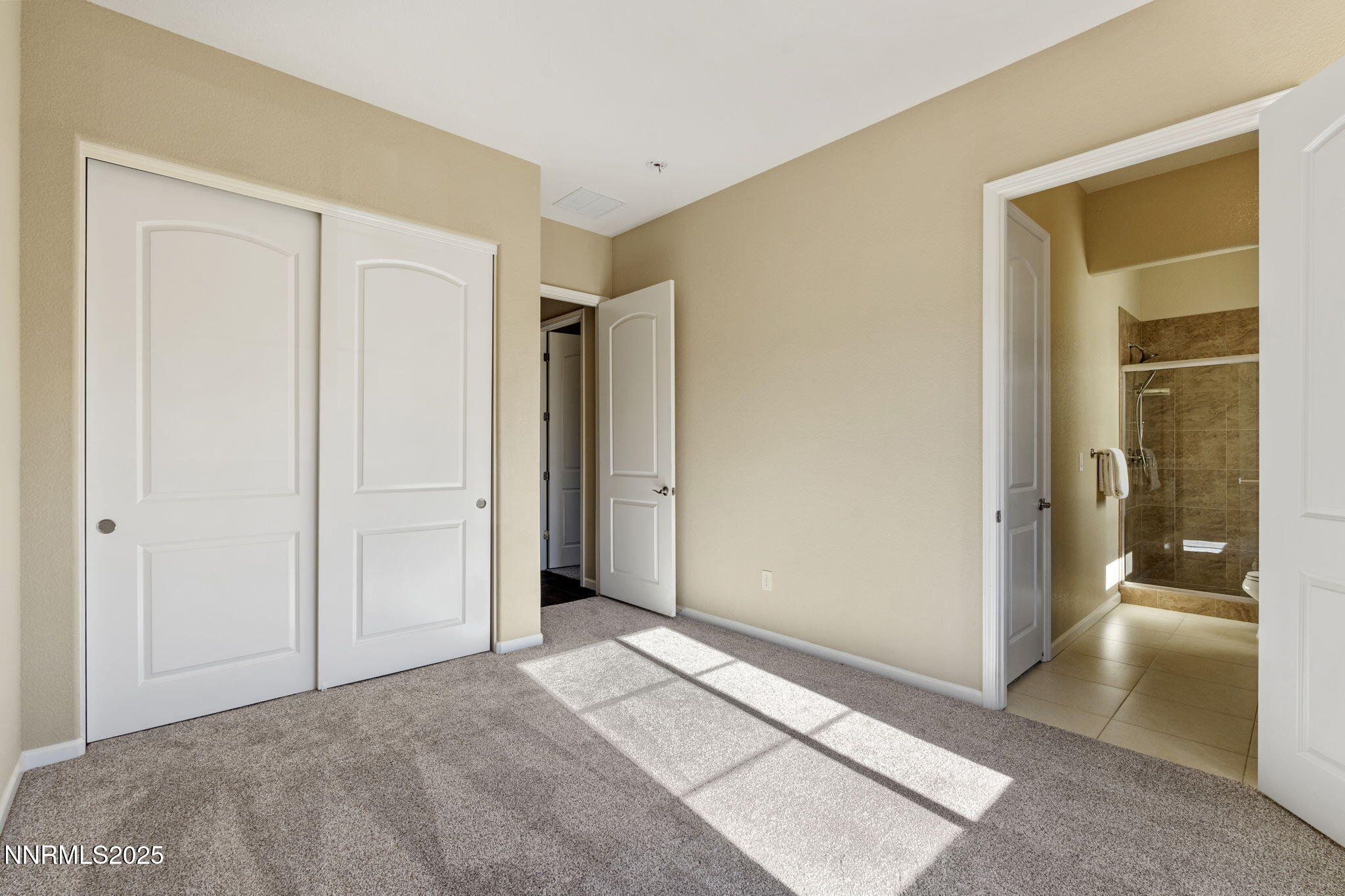 1755 Back Nine Trail Reno, NV 89523 - Photo 35 of 49 a view of a room with an empty space and wooden floor