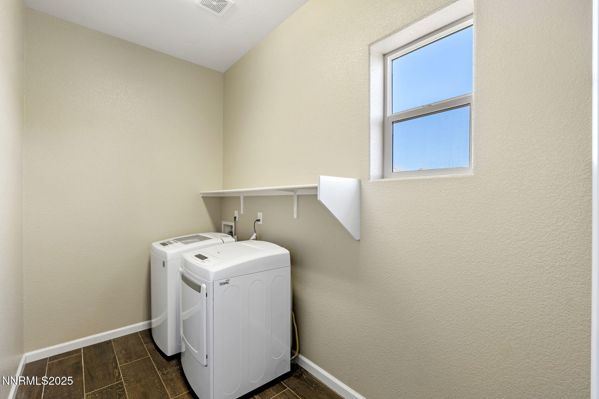1755 Back Nine Trail Reno, NV 89523 - Photo 38 of 49 a utility room with dryer and washer