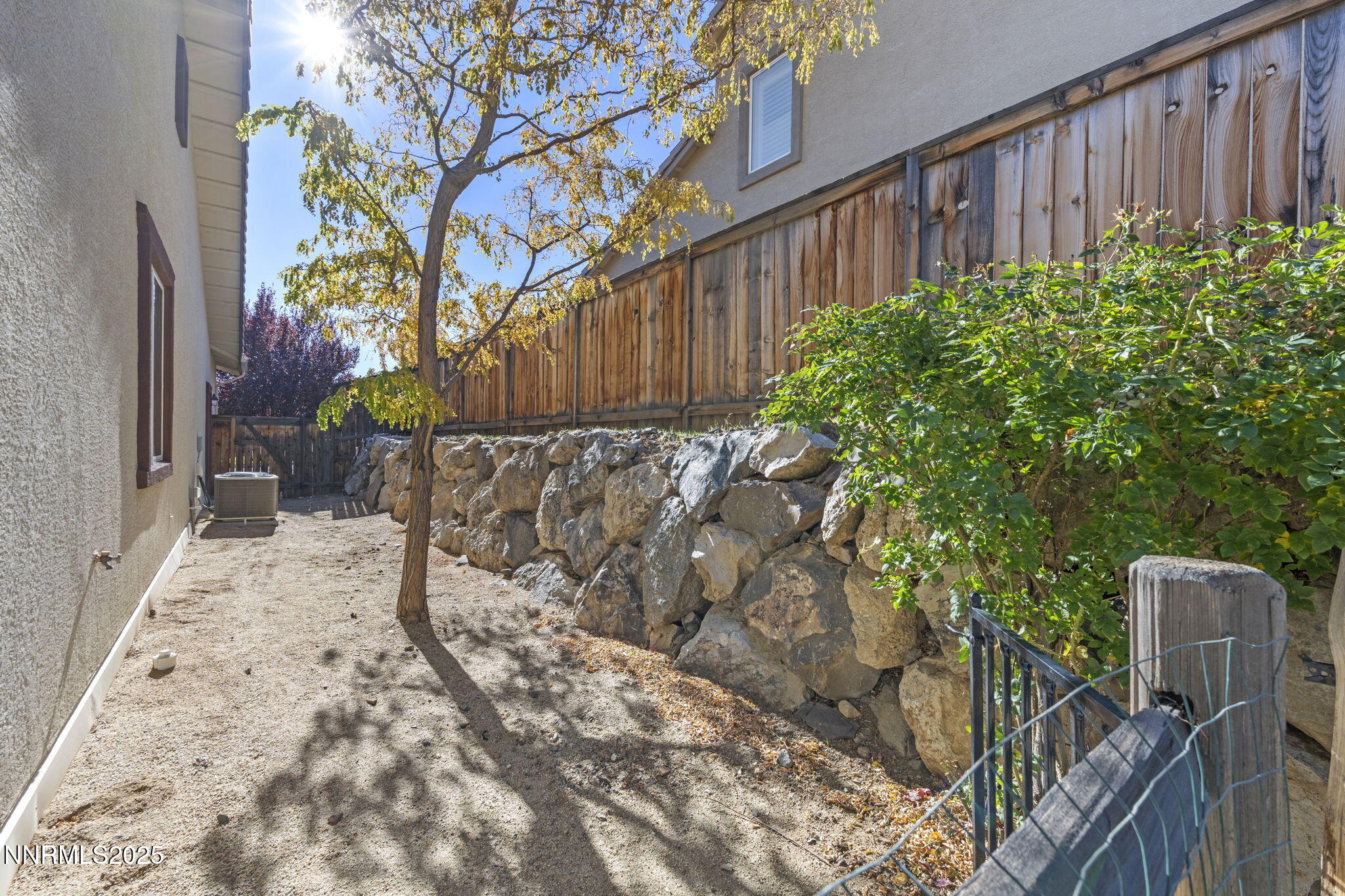 1755 Back Nine Trail Reno, NV 89523 - Photo 46 of 49 a view of a backyard with wooden fence