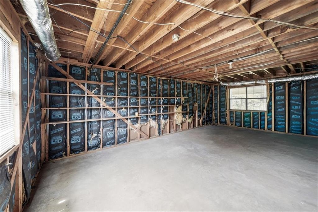 2561 Ripple Way Lawrenceville, GA 30043 - Photo 14 of 19 a view of empty room with wooden walls