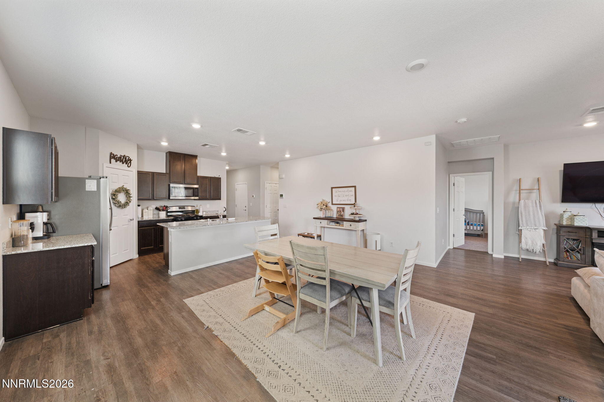 9708 Sea Glass Drive Reno, NV 89506 - Photo 28 of 51 a view of kitchen with cabinets table and chairs
