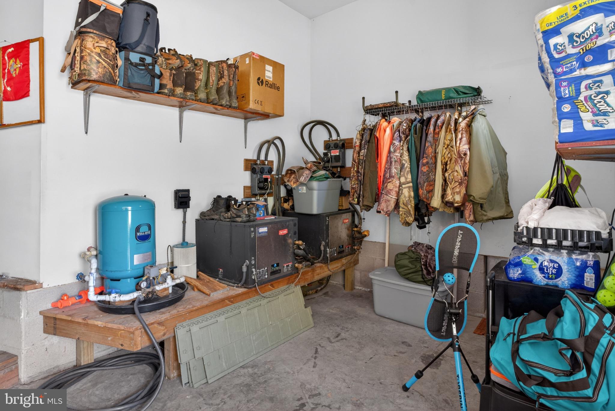 2435 Payne Road Pocomoke City, MD 21851 - Photo 64 of 75 Functional garage with organized gear.