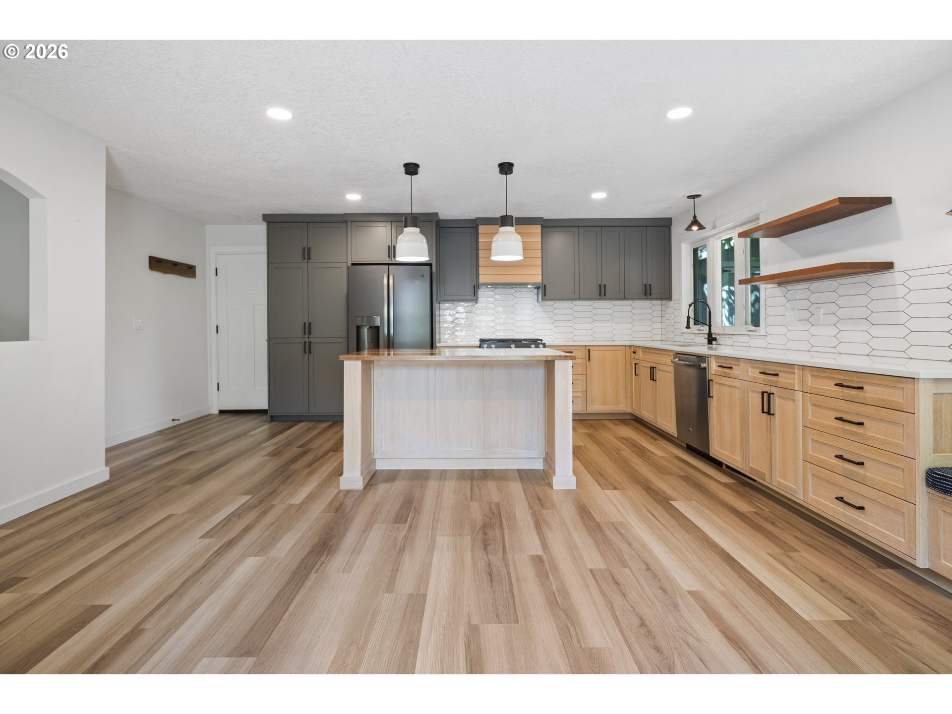 6422 Southwest Roundtree Court Portland, OR 97219 - Photo 15 of 37 Kitchen/Family Room