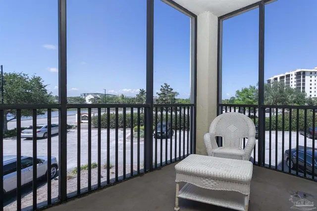 a view of building with river in front of it