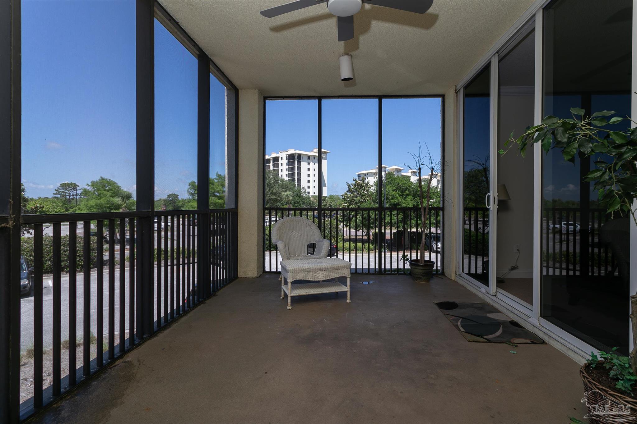 645 Lost Key Drive, Unit 206D Perdido Key, FL 32507 - Photo 43 of 60 a lobby with furniture and potted plants