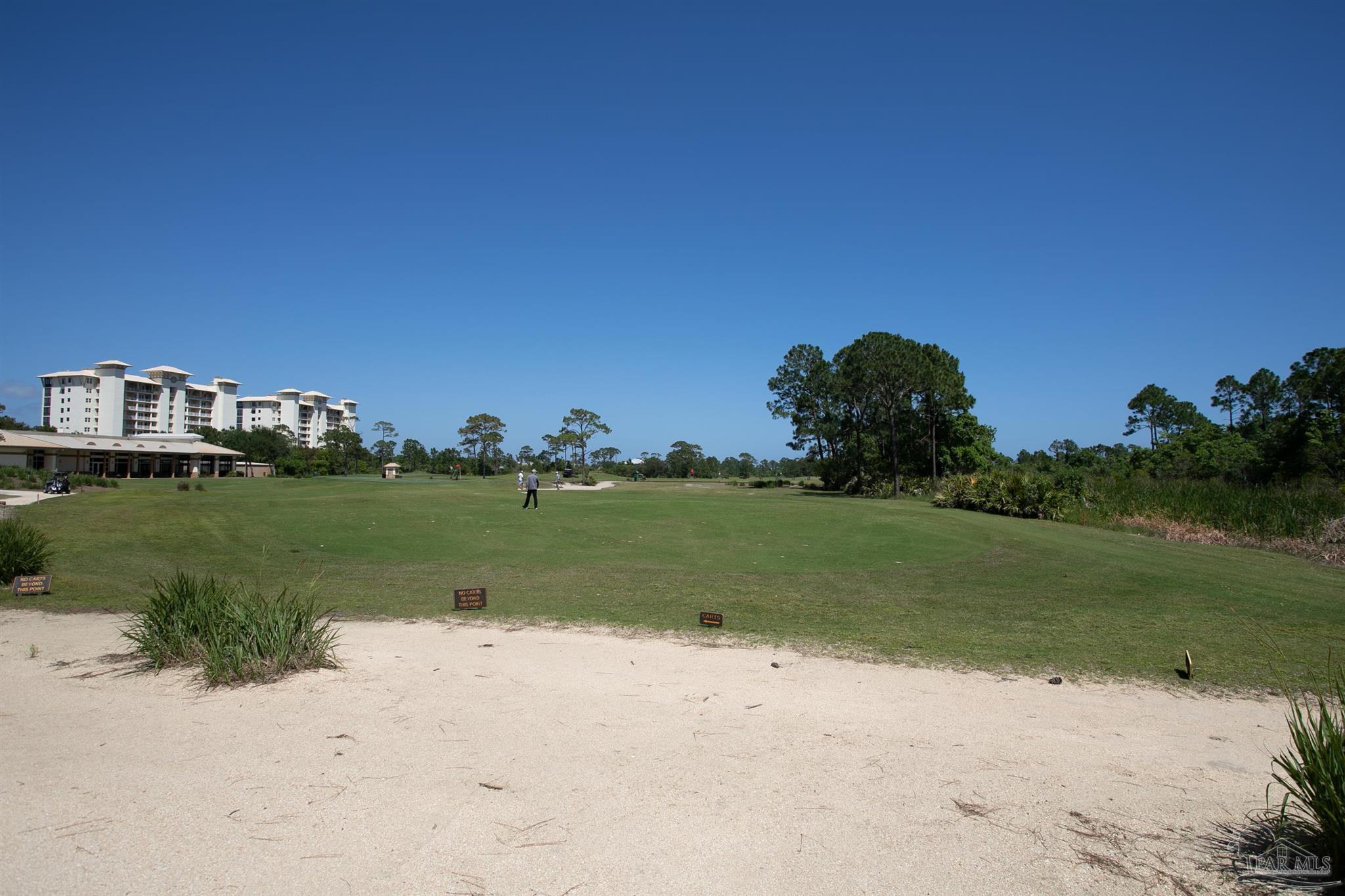 645 Lost Key Drive, Unit 206D Perdido Key, FL 32507 - Photo 47 of 60 a view of a park with large trees