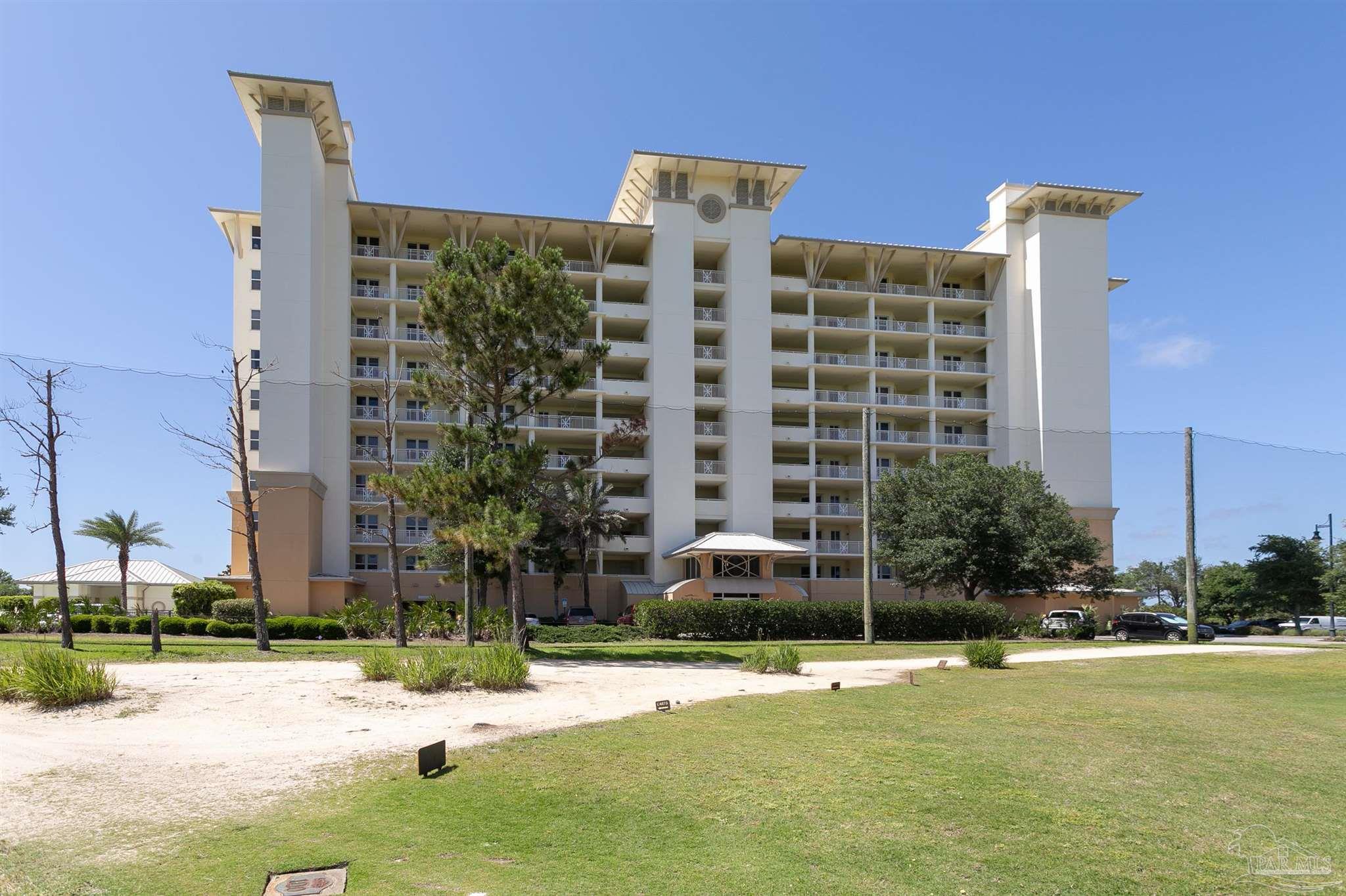 645 Lost Key Drive, Unit 206D Perdido Key, FL 32507 - Photo 48 of 60 a view of a building with a swimming pool