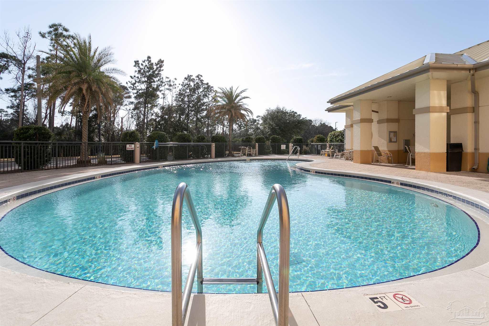 645 Lost Key Drive, Unit 206D Perdido Key, FL 32507 - Photo 56 of 60 a view of a swimming pool with a patio
