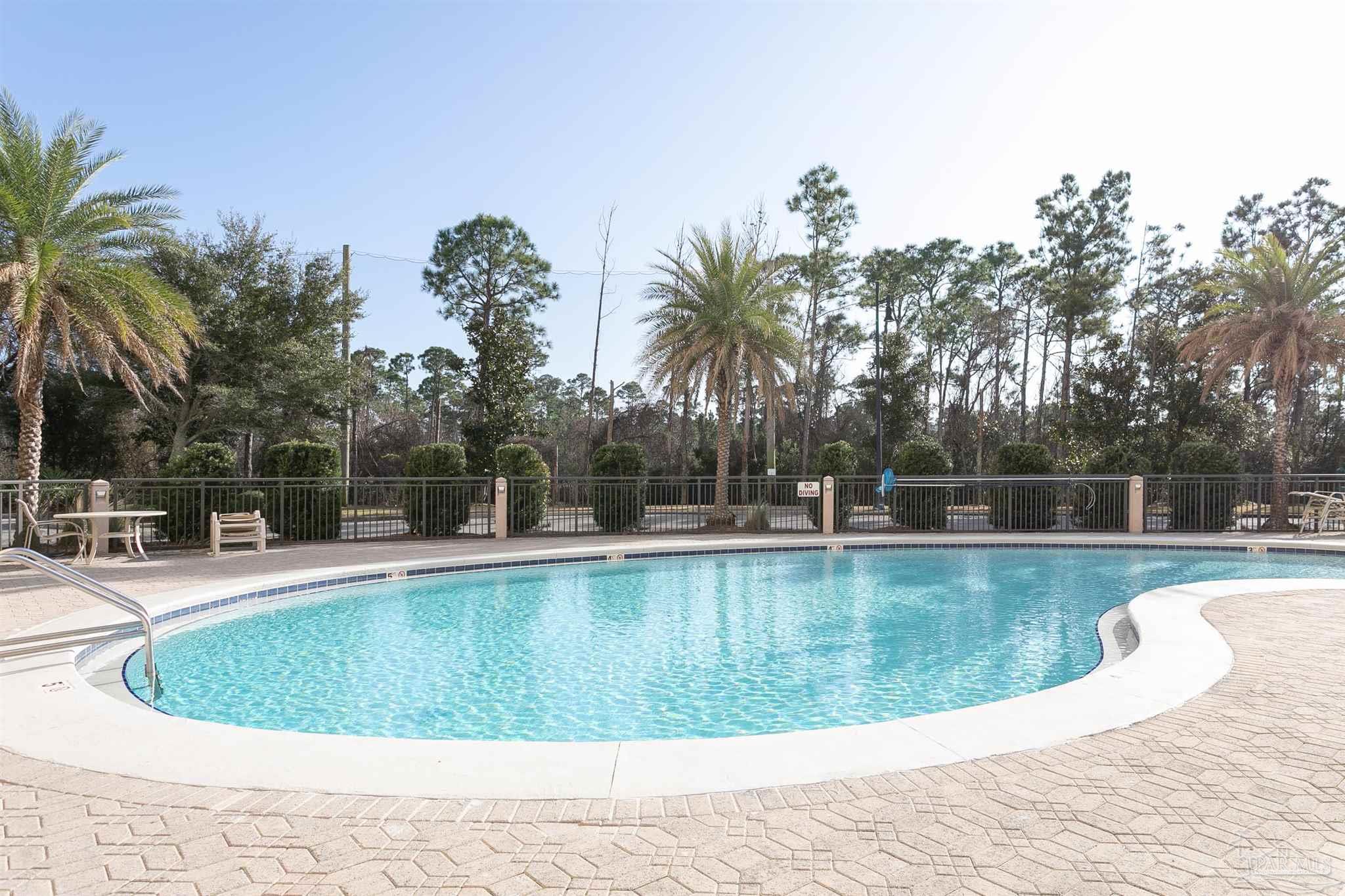 645 Lost Key Drive, Unit 206D Perdido Key, FL 32507 - Photo 58 of 60 a view of a swimming pool with a patio