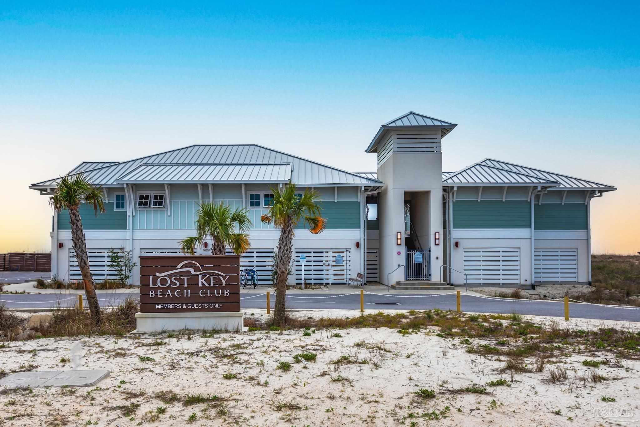 645 Lost Key Drive, Unit 206D Perdido Key, FL 32507 - Photo 63 of 72 a front view of a house with garden