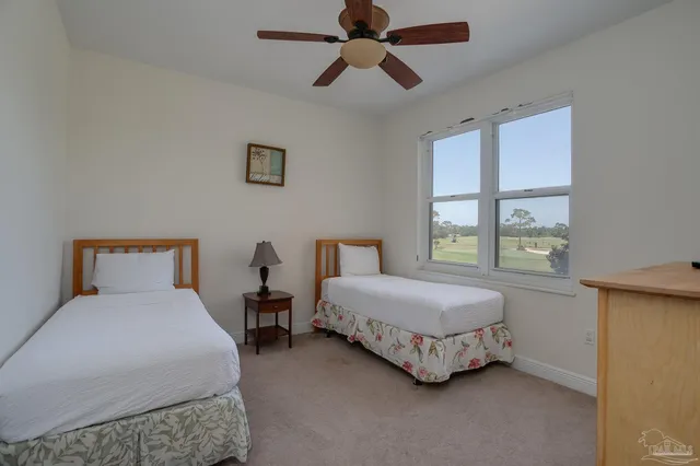 a bedroom with a bed and furniture