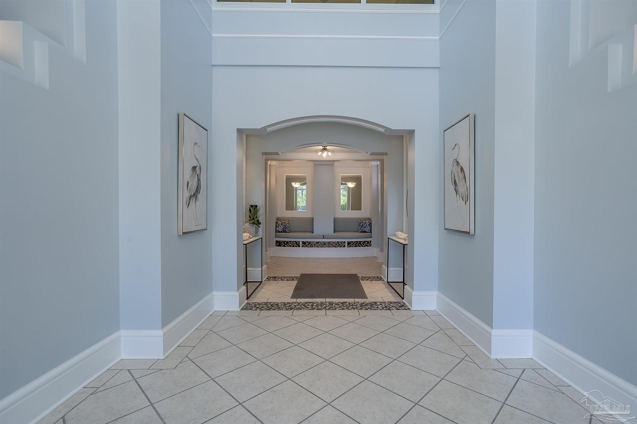 645 Lost Key Drive, Unit 206D Perdido Key, FL 32507 - Photo 9 of 72 a view of a hallway and a livingroom with a furniture