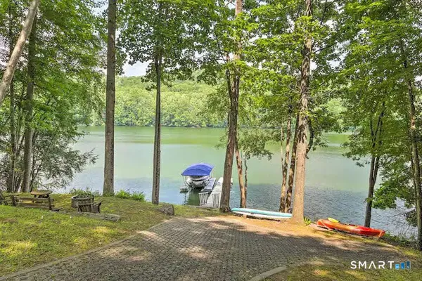 a view of a road with a yard