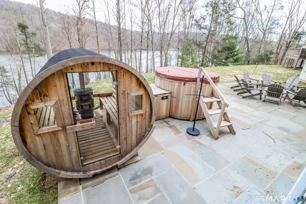 a view of a backyard with chairs