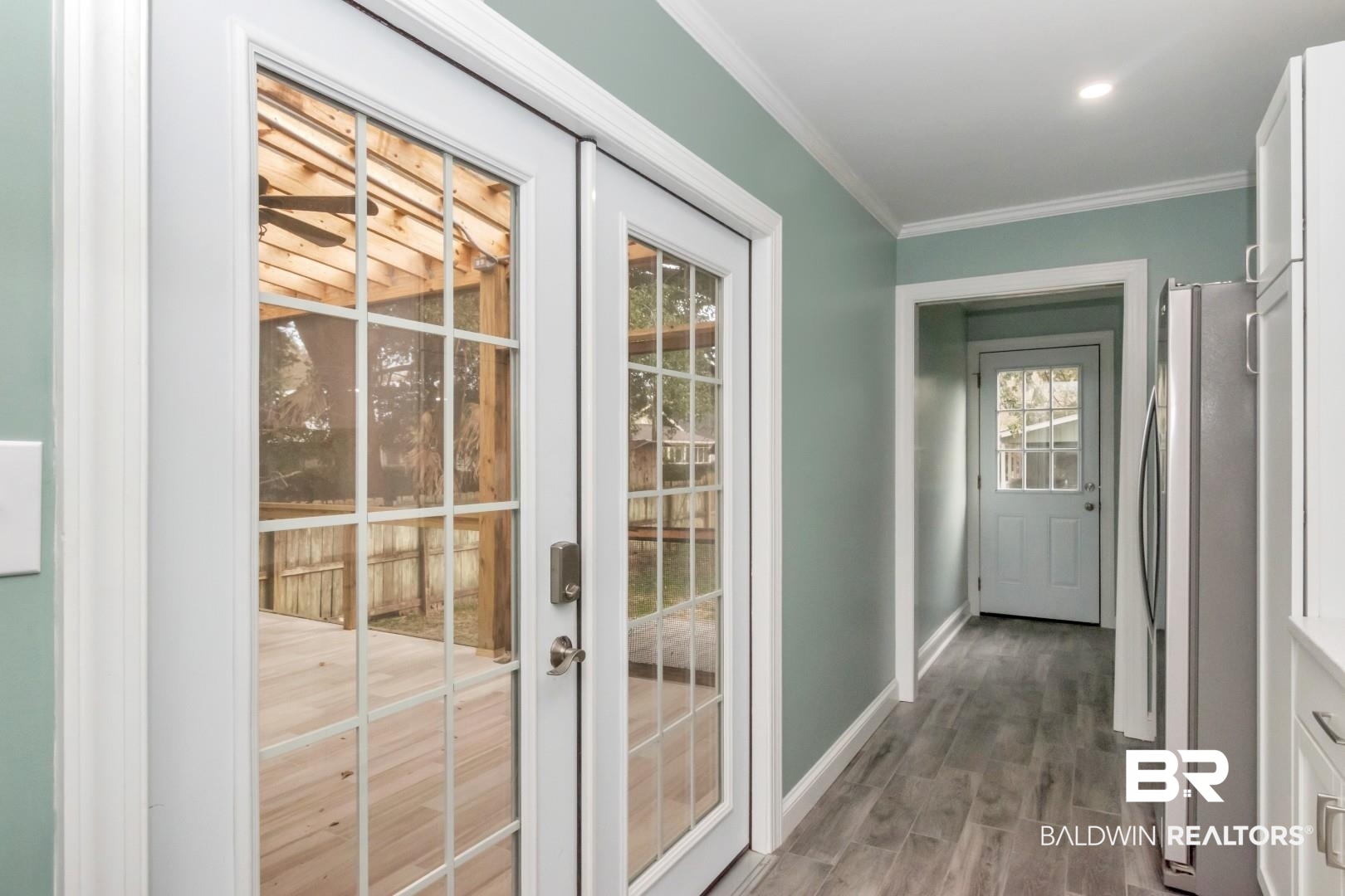 2157 Homewood Street Mobile, AL 36606 - Photo 27 of 36 Entryway featuring baseboards, recessed lighting, wood finished floors, and crown molding