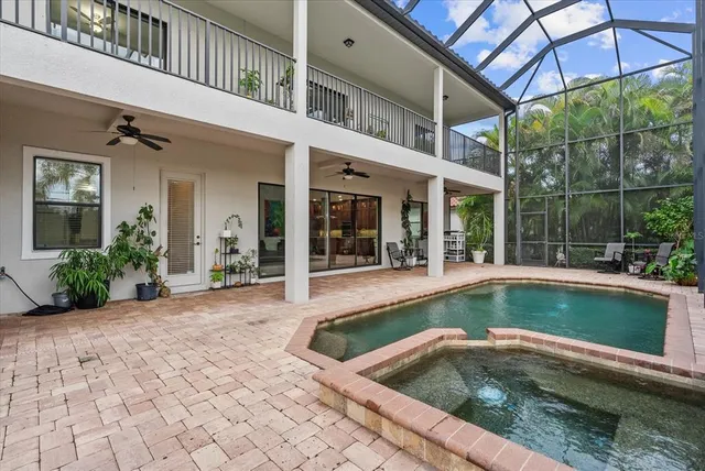 a kitchen with window and stainless steel appliances