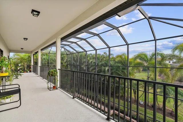 an aerial view of residential houses with outdoor space and river