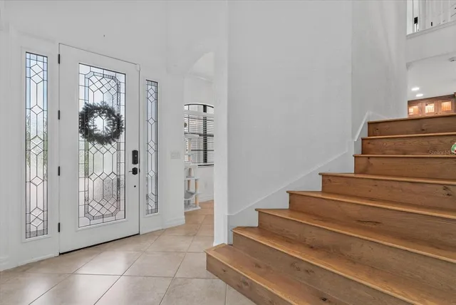 a kitchen that has a stove and a table
