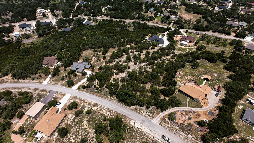 841 Rutherford Fischer, TX 78623 - Photo 18 of 22 an aerial view of residential houses with outdoor space