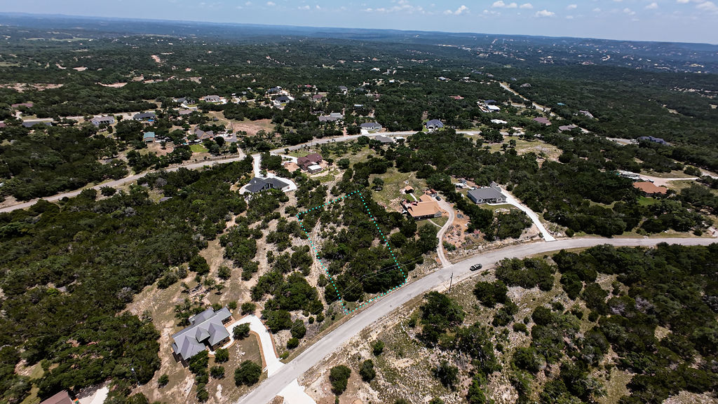 841 Rutherford Fischer, TX 78623 - Photo 2 of 22 an aerial view of town with residential houses and city view