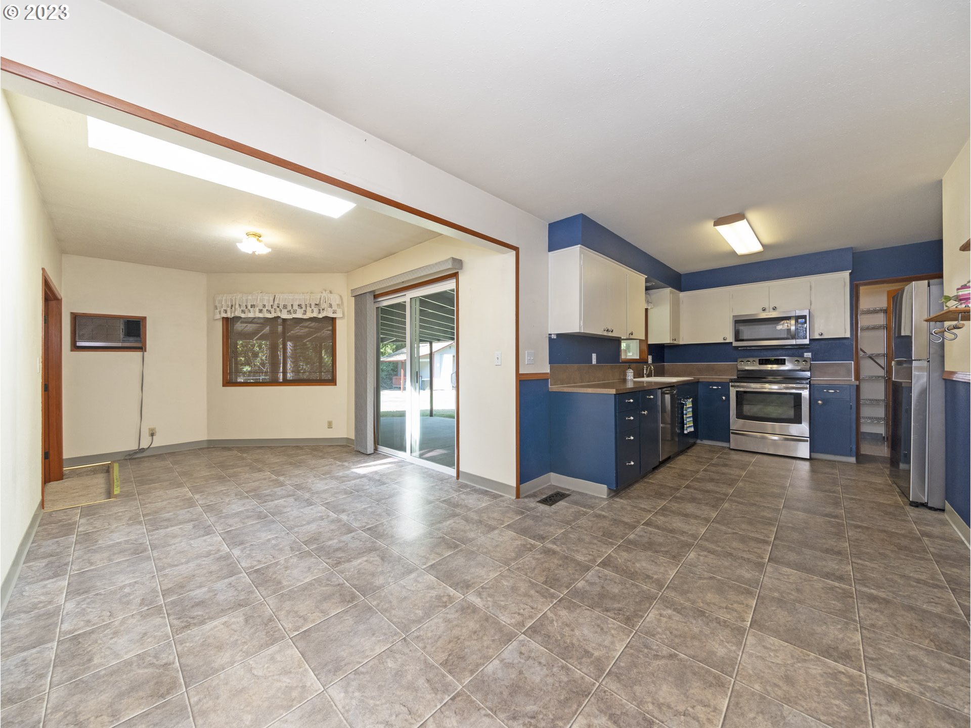 5685 Southwest River Road Hillsboro, OR 97123 - Photo 12 of 46 a view of kitchen with furniture and cabinets