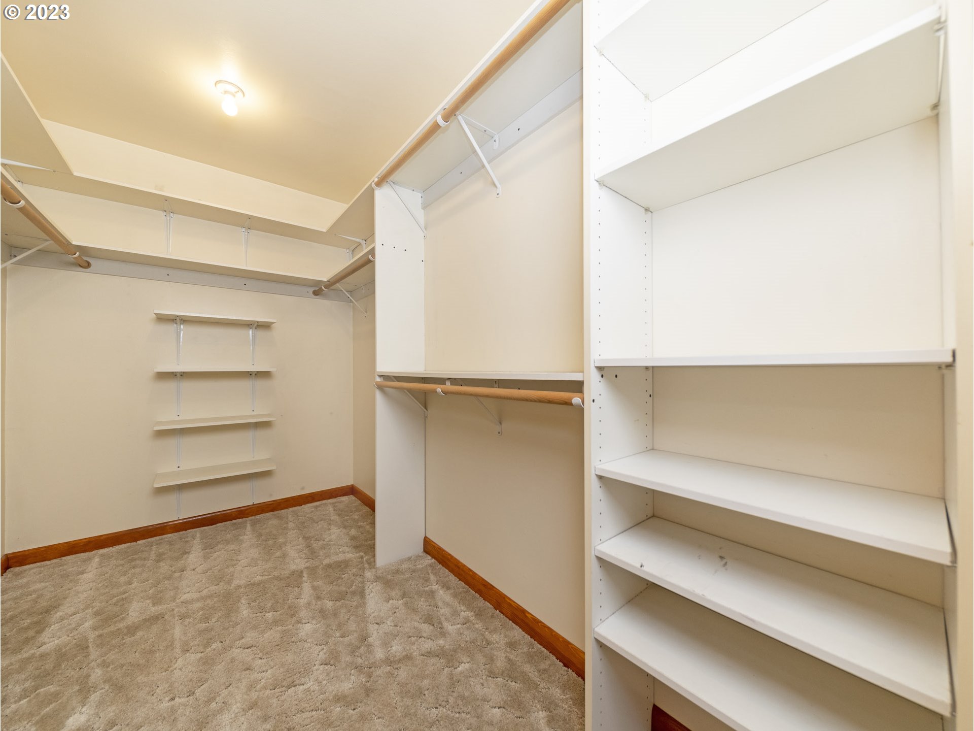 5685 Southwest River Road Hillsboro, OR 97123 - Photo 21 of 46 a view of walk in closet with empty racks