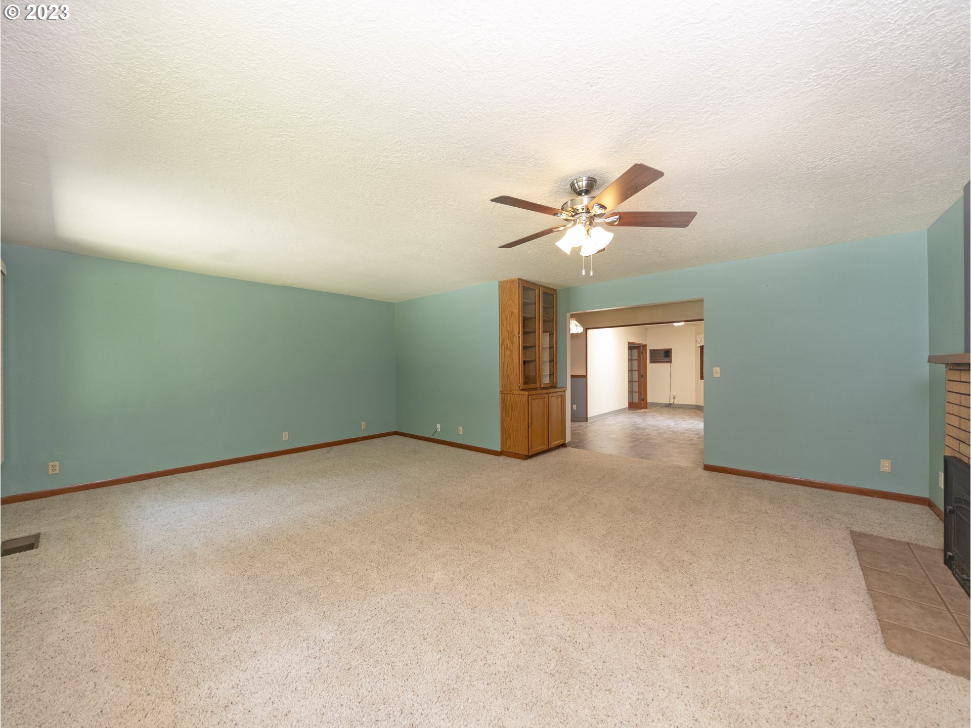5685 Southwest River Road Hillsboro, OR 97123 - Photo 24 of 46 an empty room with closet and a ceiling fan