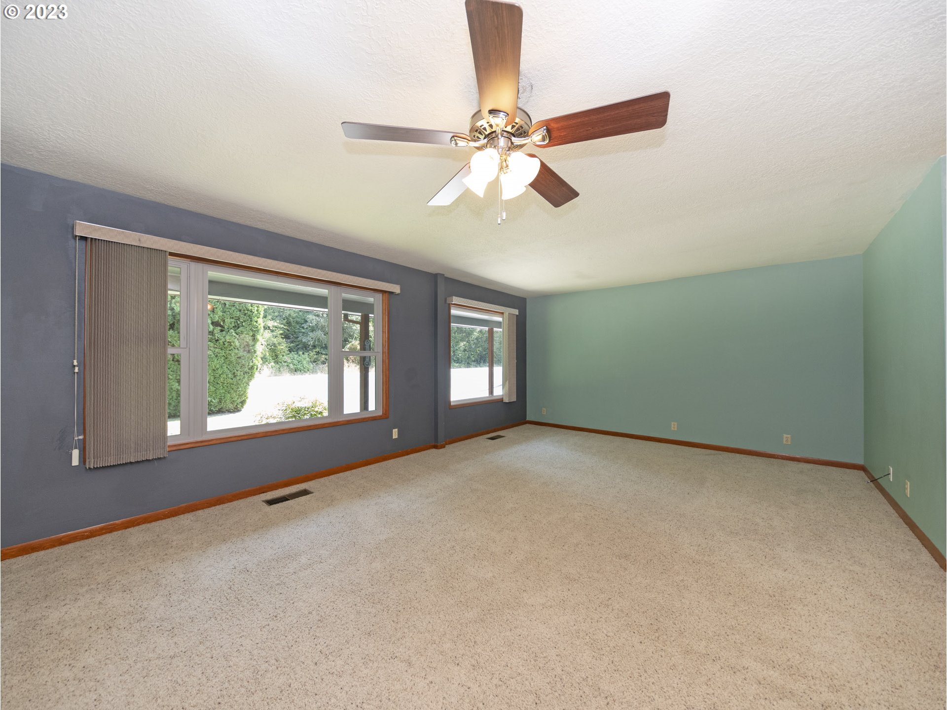 5685 Southwest River Road Hillsboro, OR 97123 - Photo 26 of 46 a view of an empty room with a window
