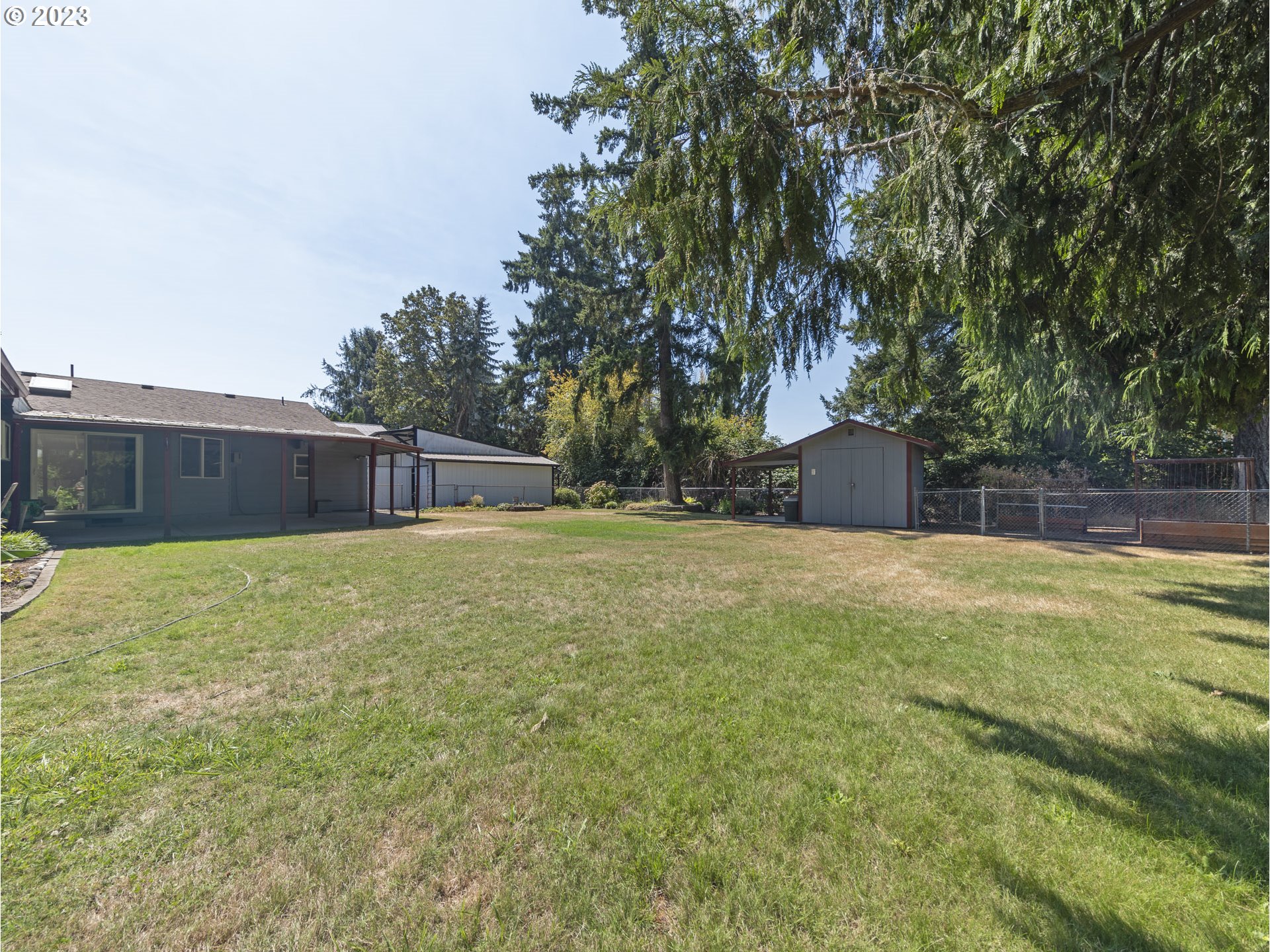 5685 Southwest River Road Hillsboro, OR 97123 - Photo 39 of 46 a house with swimming pool in front of it