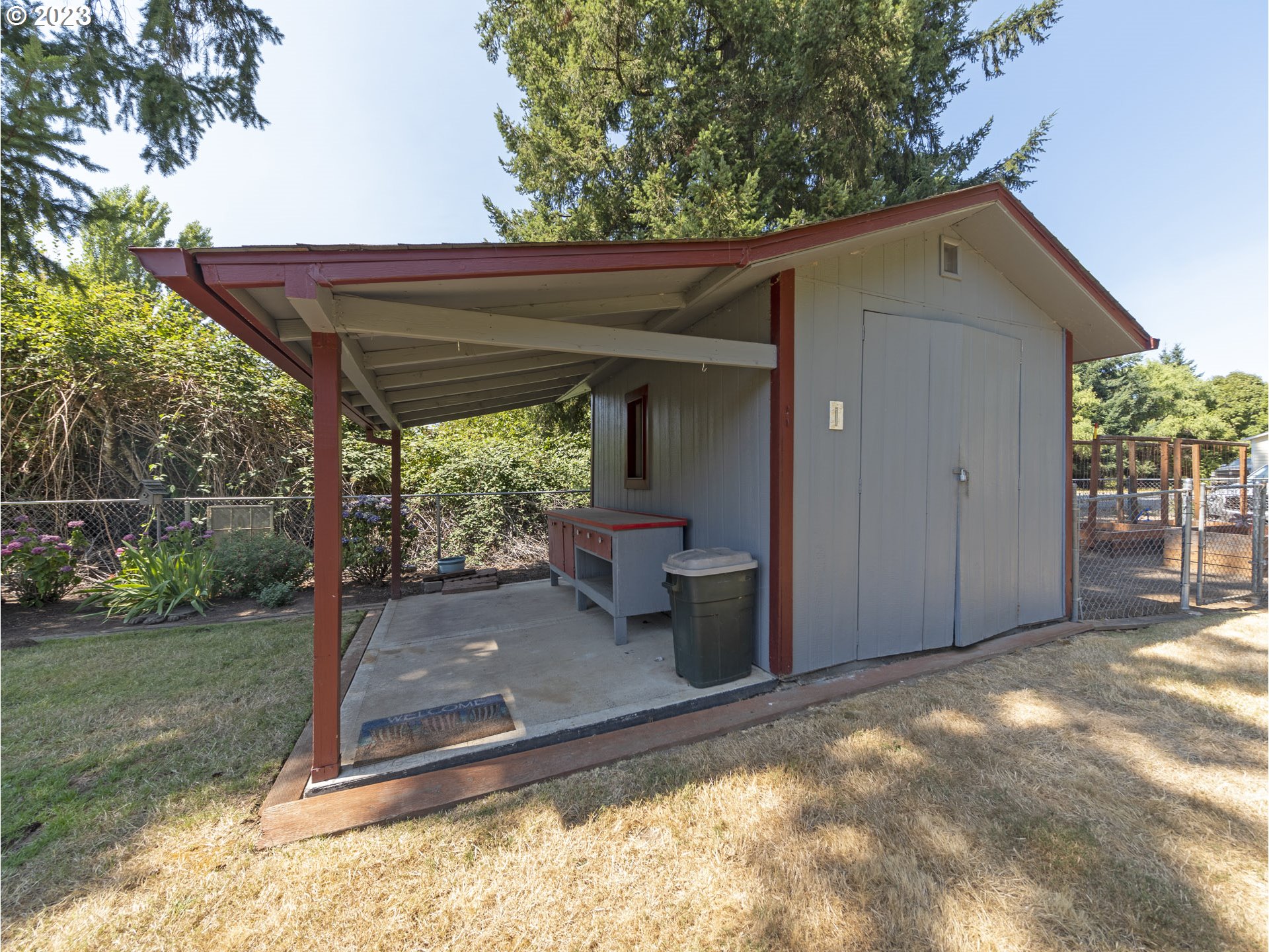 5685 Southwest River Road Hillsboro, OR 97123 - Photo 42 of 46 a backyard of a house with barbeque oven