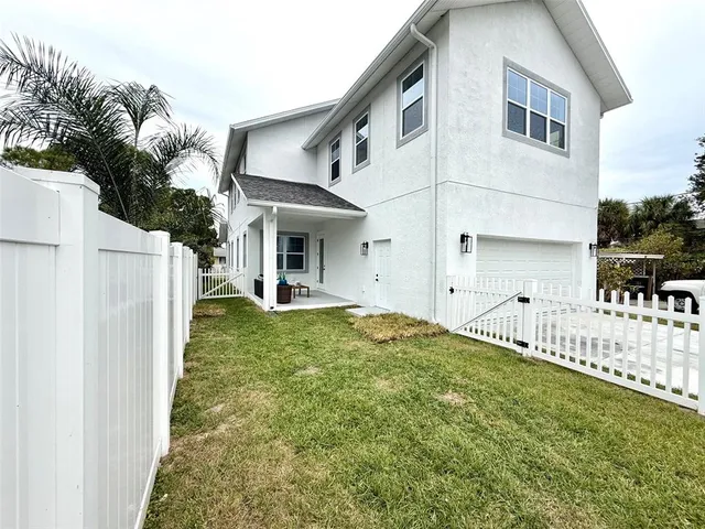 a view of backyard of house