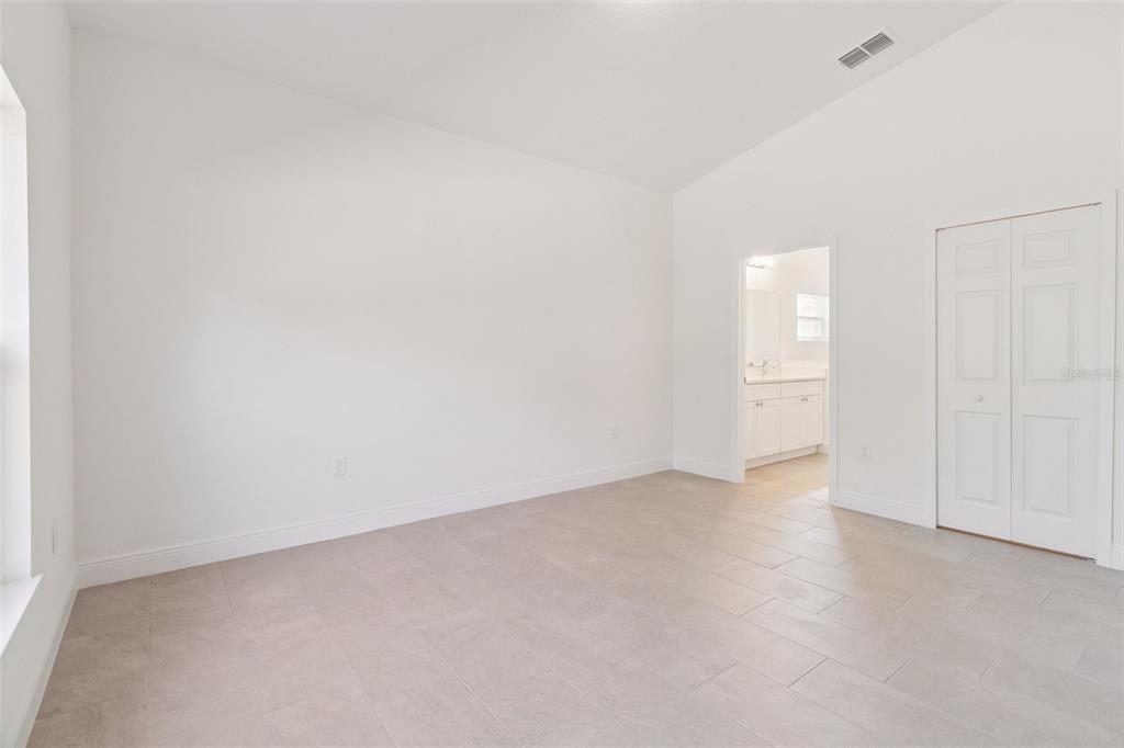 121 South Canoe Creek Road Kenansville, FL 34739 - Photo 18 of 54 a view of an empty room and entryway