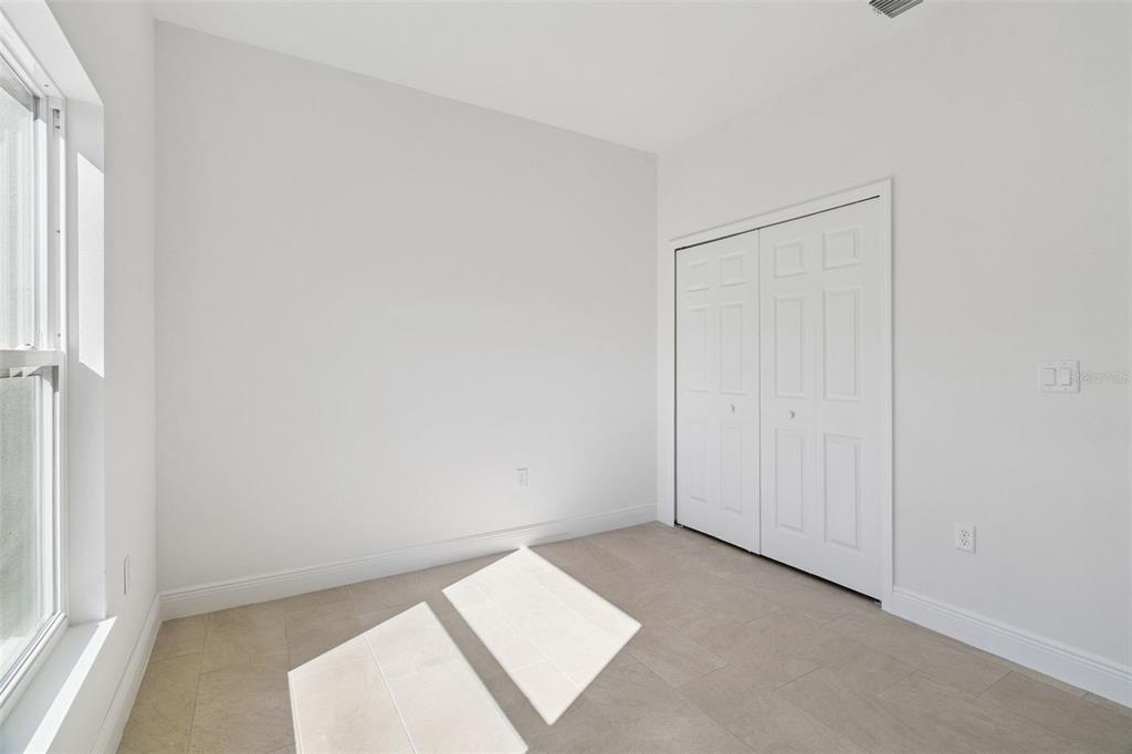 121 South Canoe Creek Road Kenansville, FL 34739 - Photo 25 of 54 a view of an empty room and window