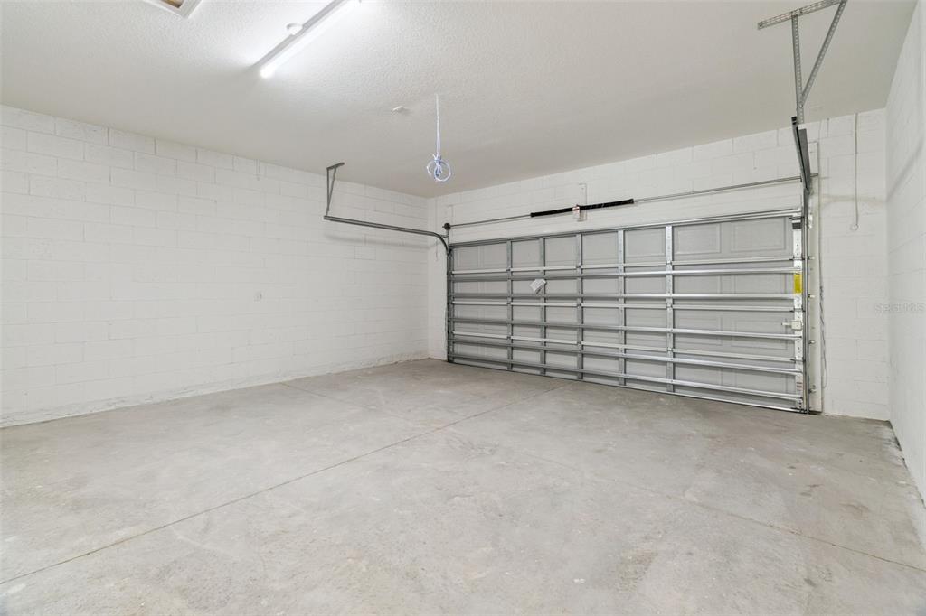 121 South Canoe Creek Road Kenansville, FL 34739 - Photo 34 of 54 a view of a garage