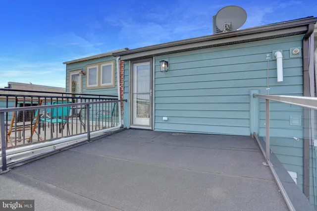 a view of a house with a roof deck