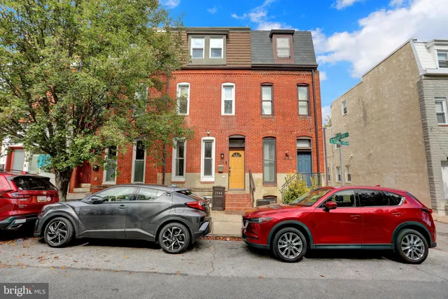a car parked in front of a building