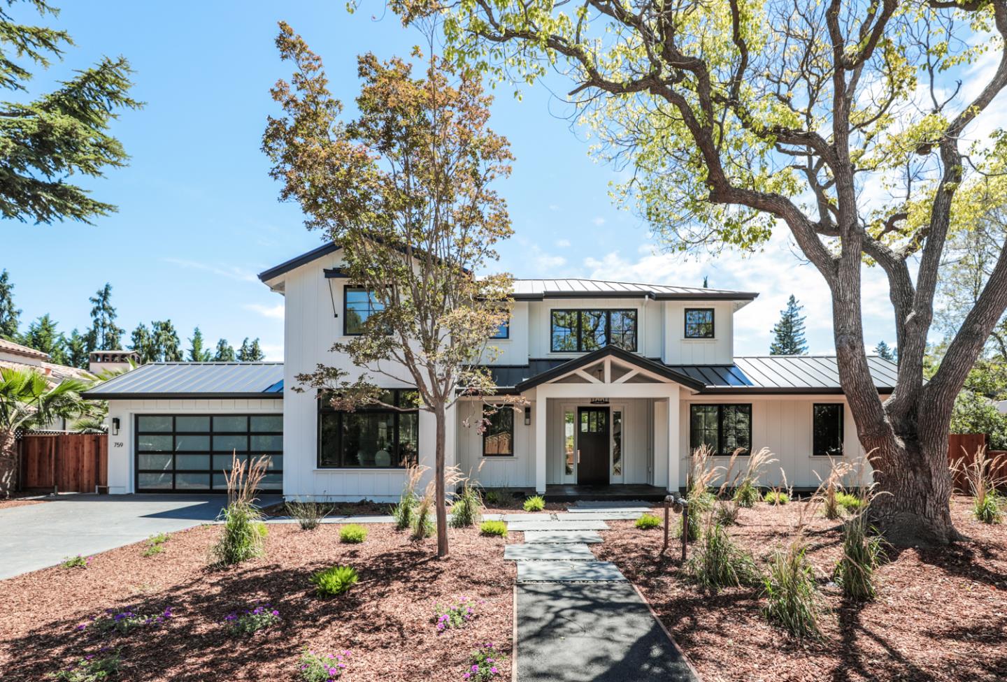 759 Sunshine Drive Los Altos, CA 94024 - Photo 2 of 47 a front view of a house with garden