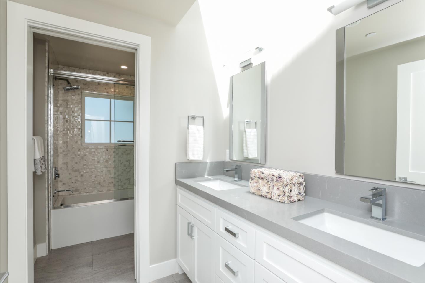 759 Sunshine Drive Los Altos, CA 94024 - Photo 24 of 47 a bathroom with a granite countertop sink and a mirror