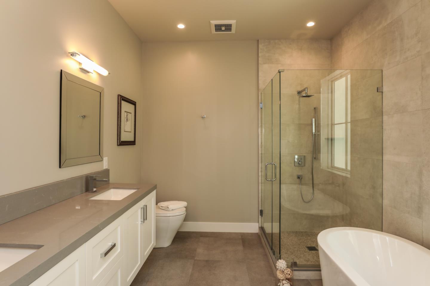 759 Sunshine Drive Los Altos, CA 94024 - Photo 41 of 47 a bathroom with a double vanity sink toilet and shower