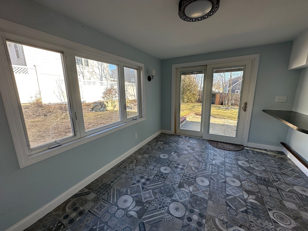 156 Parke Avenue Quincy, MA 02171 - Photo 16 of 23 a view of an empty room with a window