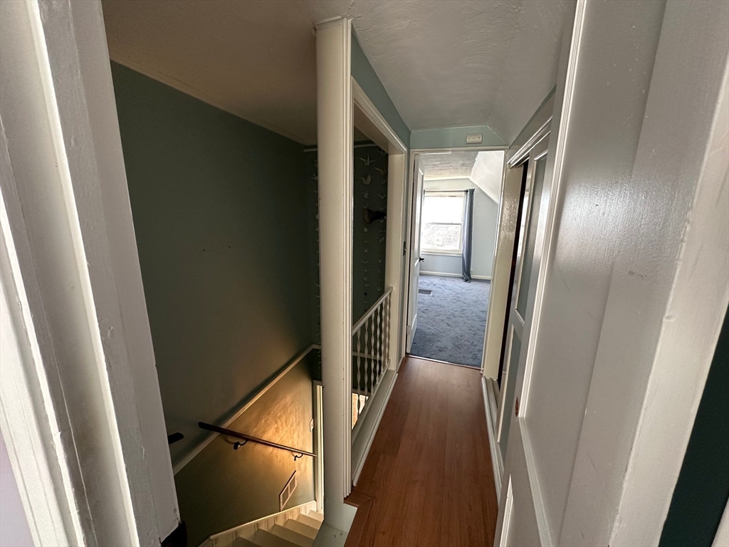 156 Parke Avenue Quincy, MA 02171 - Photo 22 of 23 a view of hallway with wooden floor
