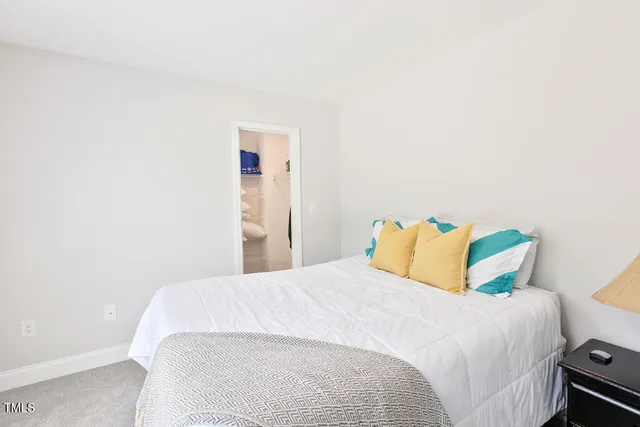 a work room with furniture and wooden floor