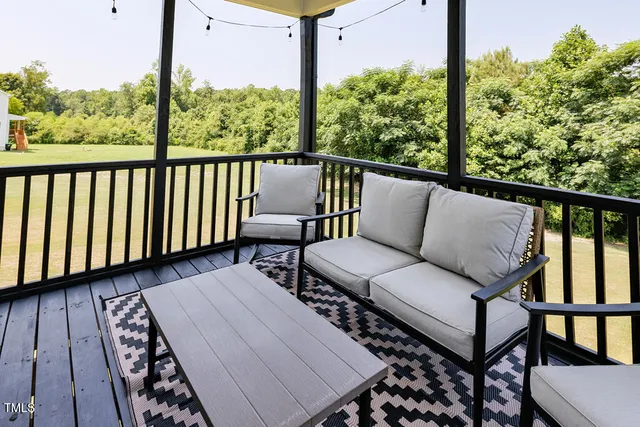 a view of a swimming pool with a yard