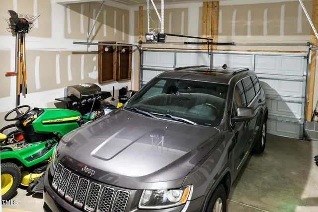 an aerial view of residential house with an outdoor space